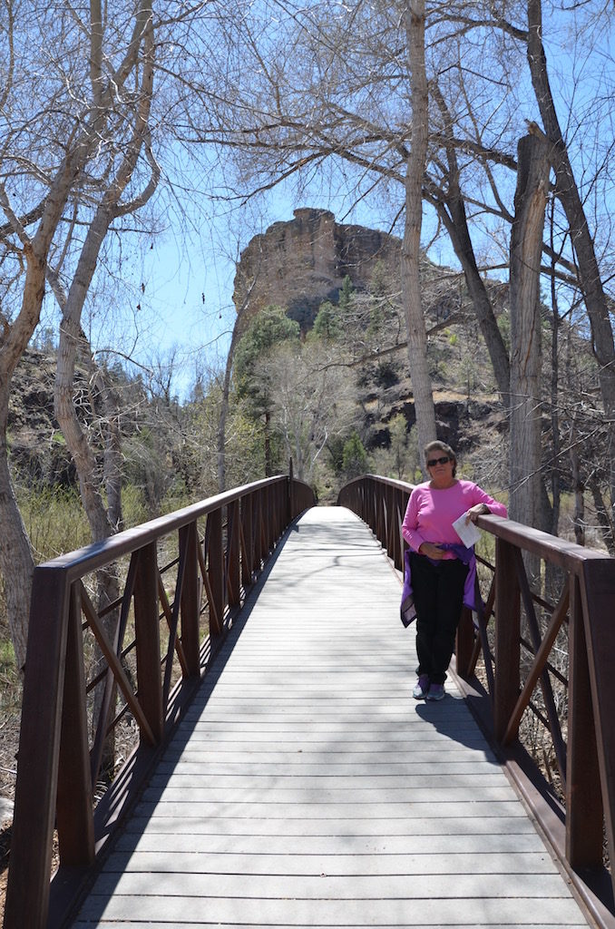 Jan on the first of many bridges along the trail leading to the Cliff Dwellings