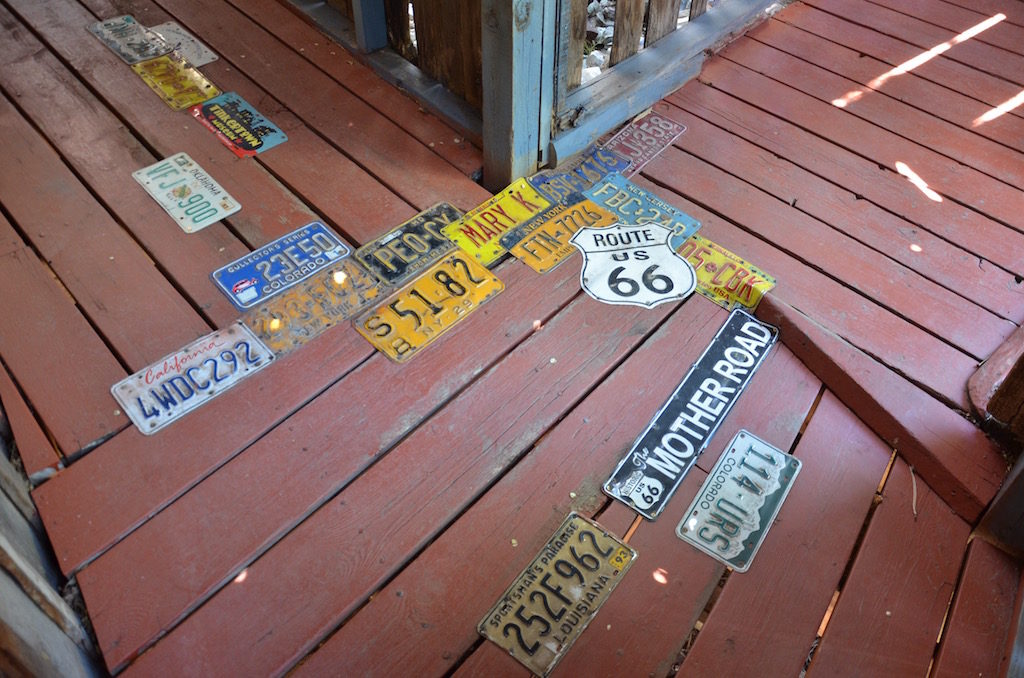 Unique use for old license plates and metal signs don't you think?