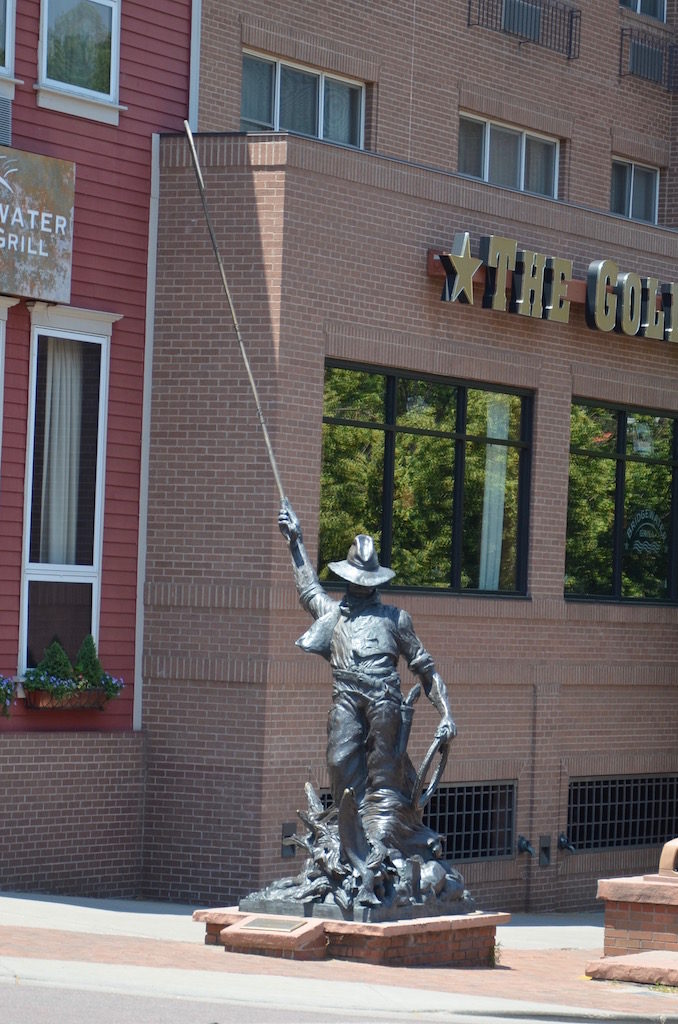 A fly fisherman , one of the many sculptures around downtown.