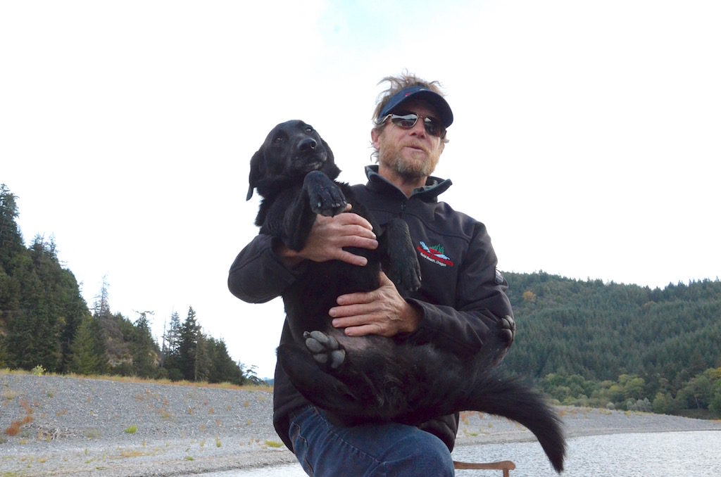 Our boat Captain Kevin and his sidekick Sadie. She loved the water!